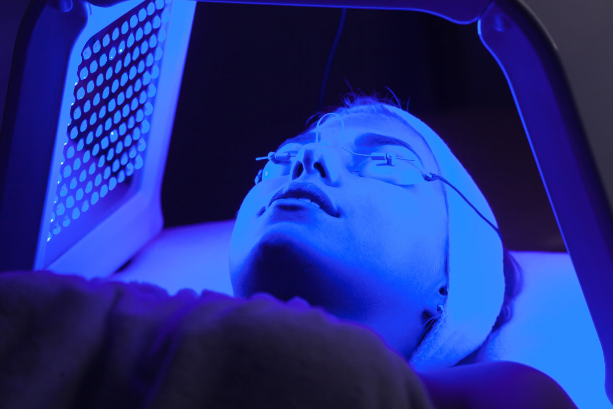 Facial-LED-Light-Emitting-Diode-1200 Woman having a Facial LED Blue Light Emitting Diode treatment at Raquel Menezes Aesthetic Medicine - landscape image