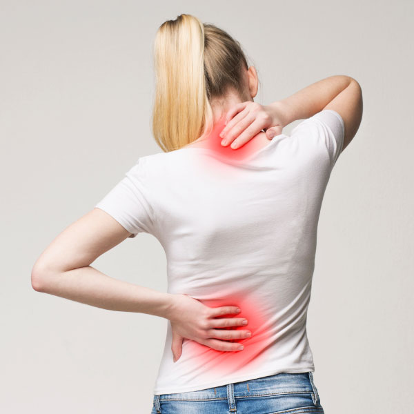 Woman with sports injury and back pain